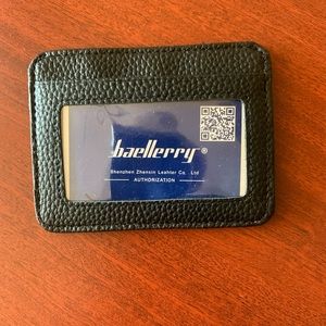 New baellerry Black leather Men’s wallet/credit card holder.Price fixed